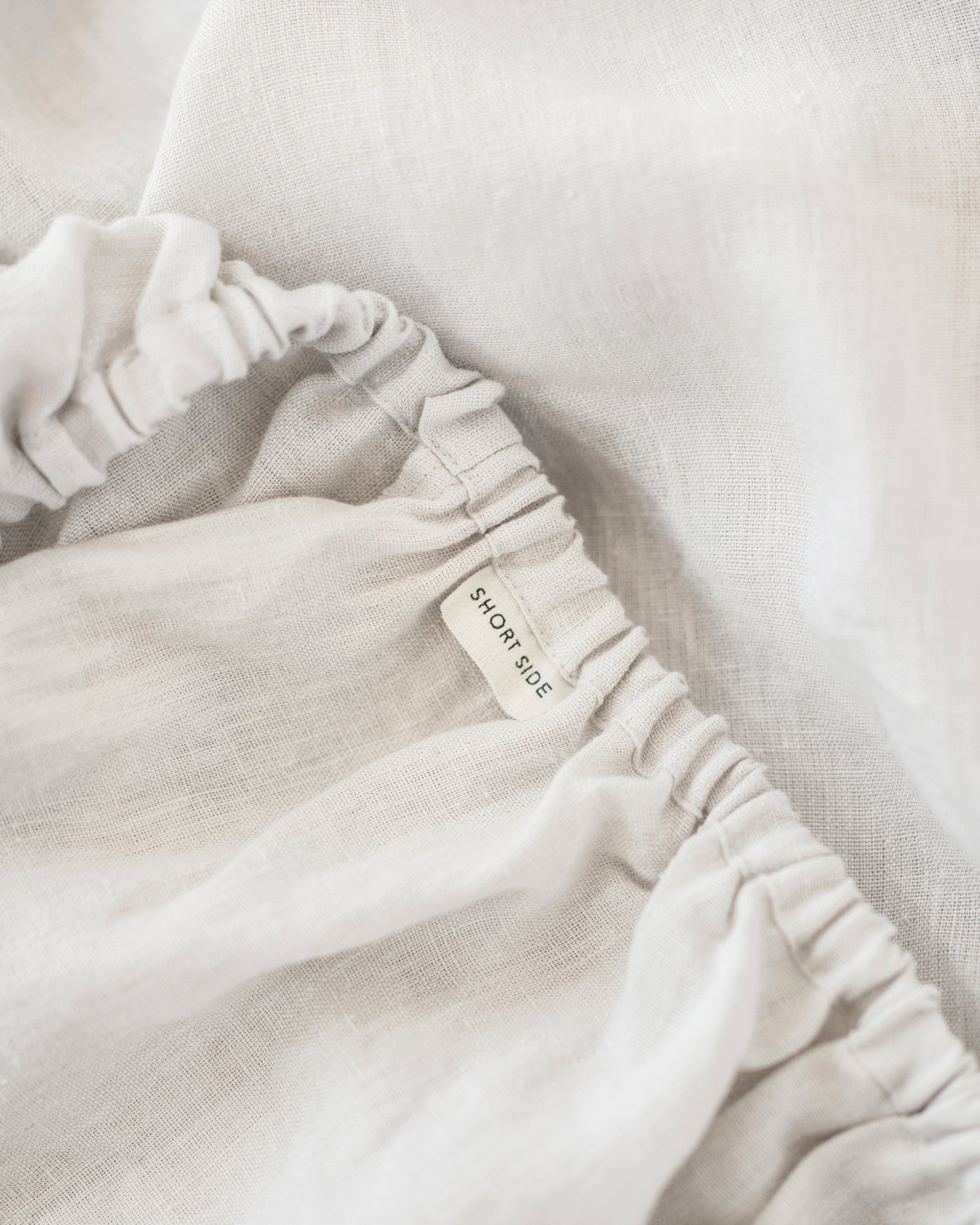 Light gray linen fitted sheet