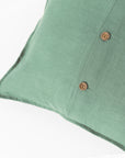 Pillow cover with buttons in Matcha green