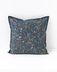 Pillow cover with buttons in Wildflowers print on deep navy blue