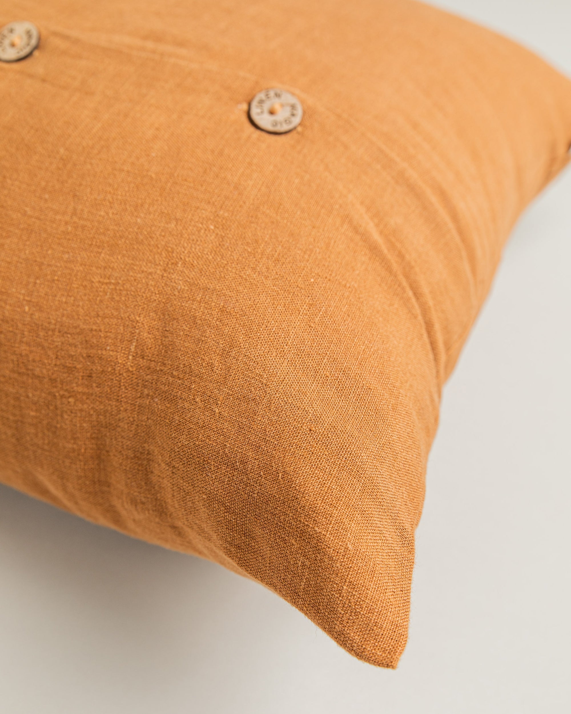 Deco pillow cover with buttons