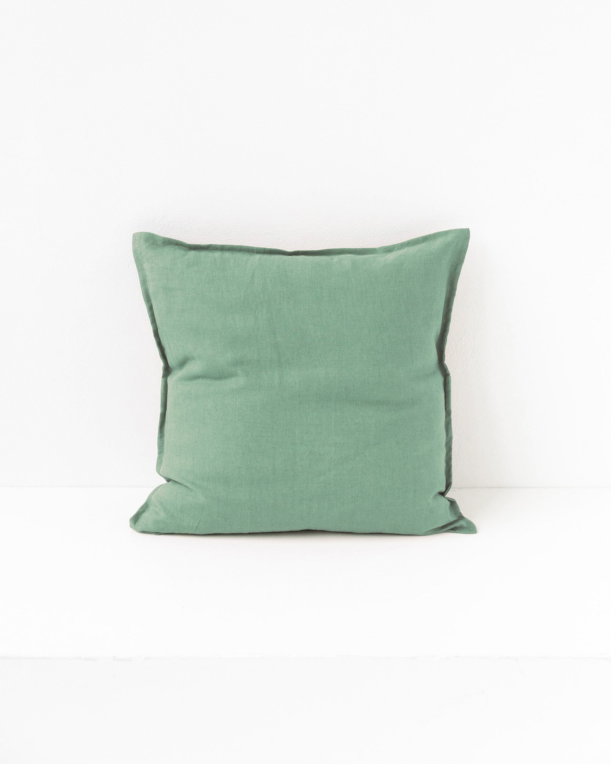 Pillow cover with buttons in Matcha green