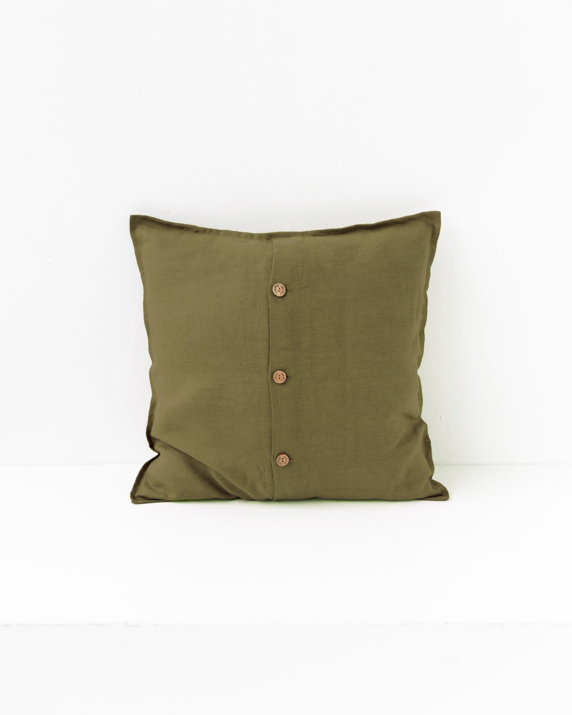 Pillow cover with buttons in Olive green