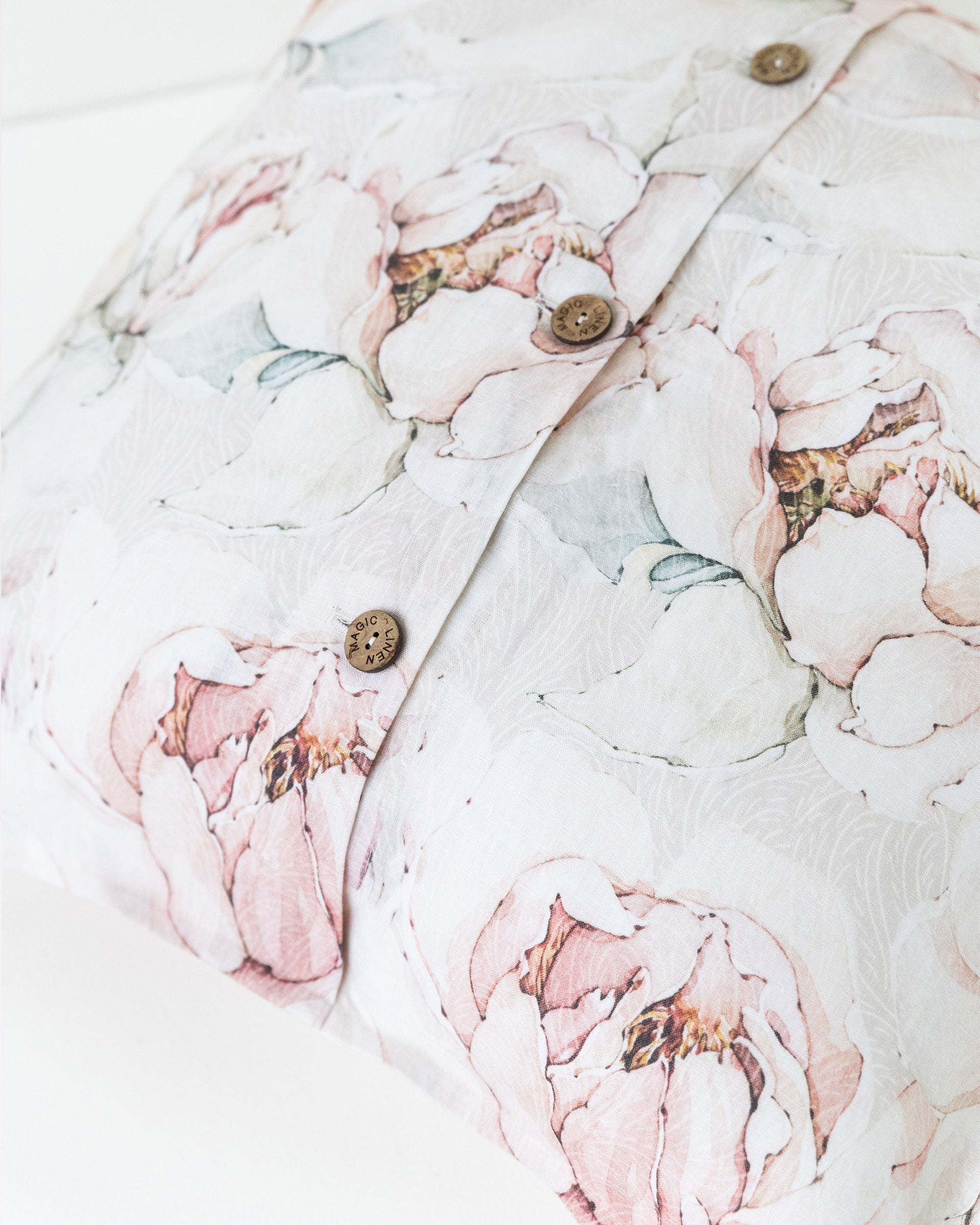 Pillow cover with buttons in Pastel peonies print